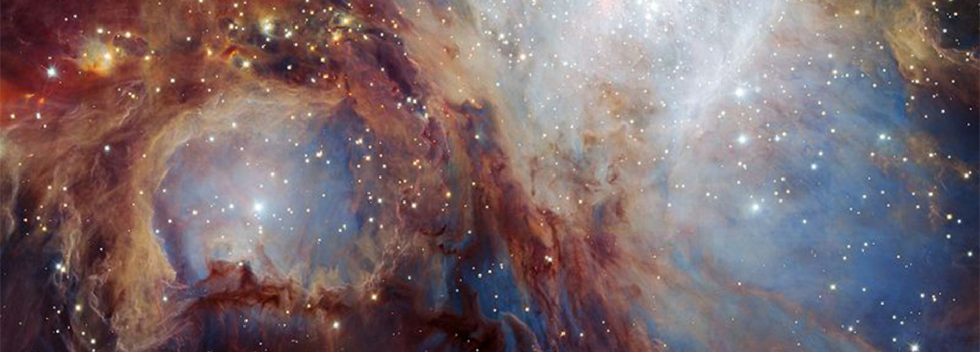 part of the Orion Nebula: a colorful nebula with a lot of young stars